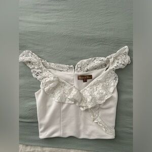 Laced In Love lace trimmed white v-neck top. Size: US 6